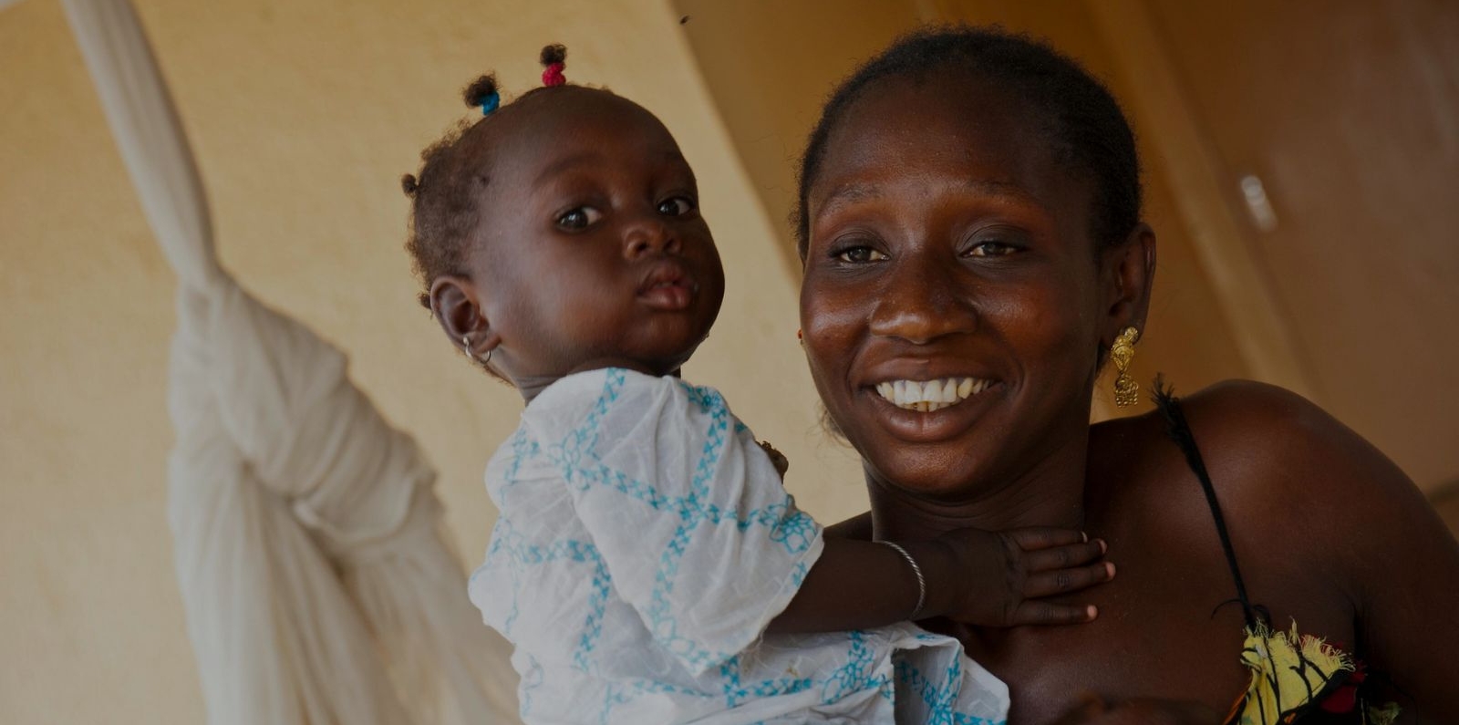 woman farmer and her baby